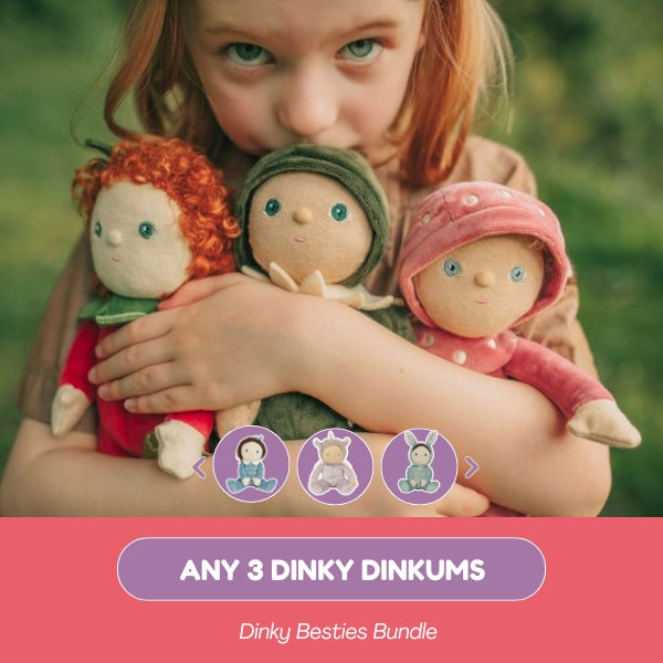 Child holding three dolls with a promotional banner for 'Any 3 Dinky Dinkums' bundle.