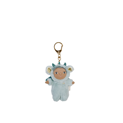 Plush keychain of a baby in a blue outfit with a gold ring on a white background