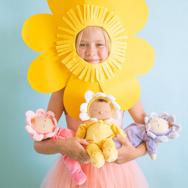 Adorable Dozy Dinkums plush flower doll in Pip Buttercup. Soft and cuddly, perfect for play and snuggling. Made from high-quality, safe materials.