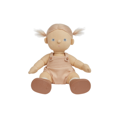 Strawberry blonde haired, posable doll for kids. Snuggle them, dress them up and style their hair. Each Doll comes with its own removable gender-neutral outfit, socks, nappy, and shoes, perfect for interactive doll play.