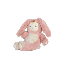 Pink plush bunny toy with white paws on a white background