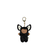 Black plush keychain with cat ears on a white background