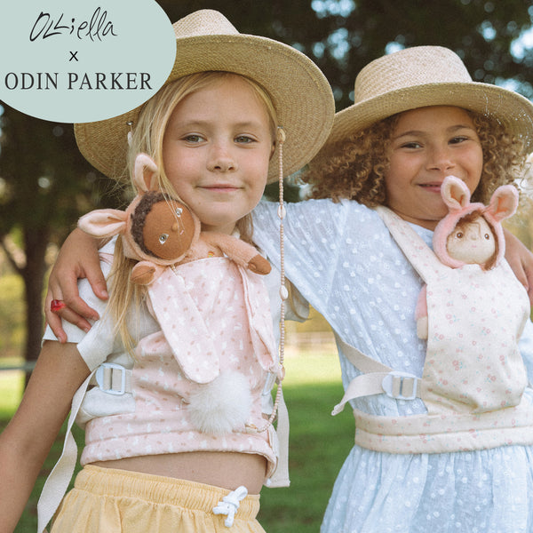 This soft, easter-themed pink doll carrier features adjustable straps and a snug fit, ideal for kids to tote their dolls comfortably. Perfect bunny-themed doll accessory, plush carrier for toddlers.