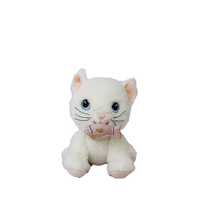 White plush cat toy with a pink fish on a white background