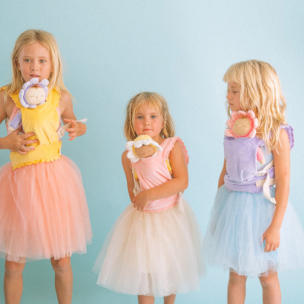 Adorable Dozy Dinkums plush flower doll in Pickle Lavender. Soft and cuddly, perfect for play and snuggling. Made from high-quality, safe materials.