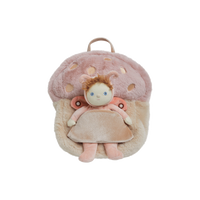 Plush backpack with a fairy doll inside on a white background