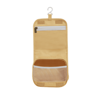 Compact, durable kids yellow toiletry bag by Olli Ella. Perfect for toiletries and travel essentials. Ideal for organized packing, made from eco-friendly materials.