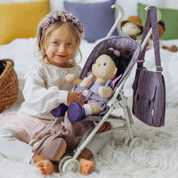 Olli Ella purple doll pram for imaginative doll play.