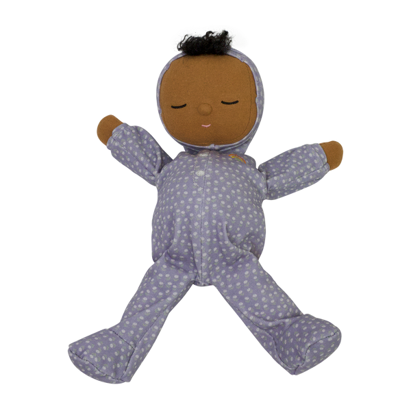 Dozy Dinkum doll with purple velvety onsie outfit. Perfectly weighted doll for calm. Plush doll with brown hair, perfect for cuddling and interactive doll play.
