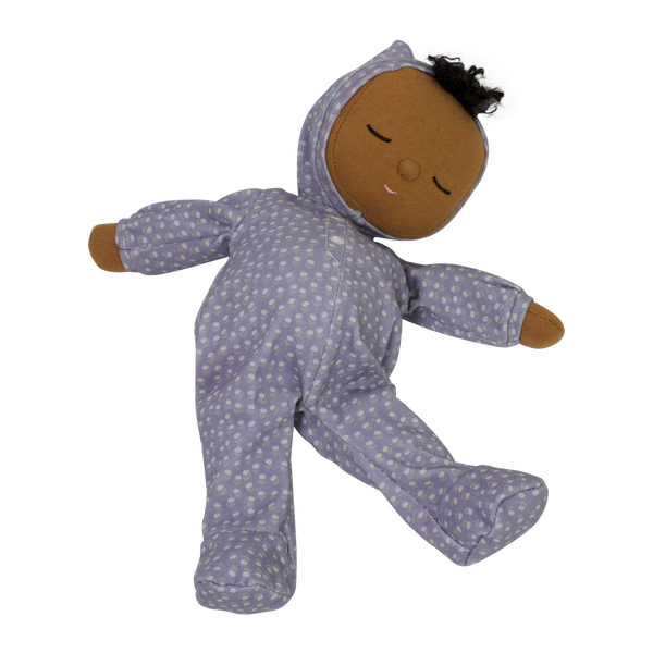 Dozy Dinkum doll with purple velvety onsie outfit. Perfectly weighted doll for calm. Plush doll with brown hair, perfect for cuddling and interactive doll play.