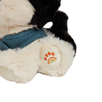 Olli Ella Dinkum Dog Lucky - black and white dog close view of embroidered rainbow paw print