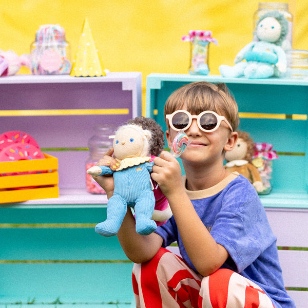 Limited-edition, palm sized, collectable corduroy kids plush toy. Bonnie Buttercream is a blue weighted plush toy in a velvet onsie, perfect for imaginative kids play.