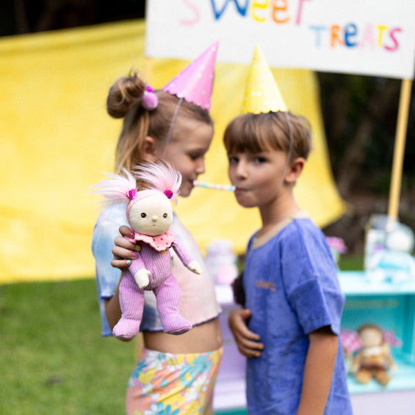 Clara Cupcake, our pink and purple corduroy mini plush toy. Collectable, Soft and cuddly, and snuggled in a non-removable velvet onesie, Clara Cupcake is a must have in your toy collection.