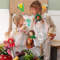 6-pack of vegetable-themed plush dolls, designed with a posable body and gentle weighting for creative play. These limited-edition, pocket-sized toys are a cuddly companion, dressed in a non-removable velvet onesie, and ready for any adventure.