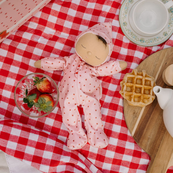 Olli Ella Dozy Dinkum Doll - strawberry. Floppy soft-doll suitable with pink strawberry printed onesie,