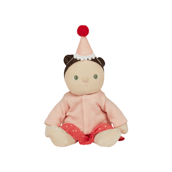 cute sitting doll with pink cardigan and polka dot dress