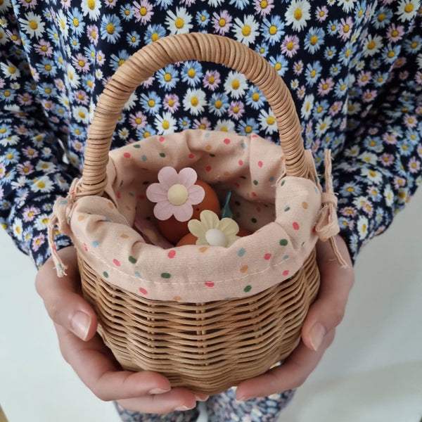 Easter themed handwoven rattan basket with printed fabric lining. Designed for kids to carry their favourite toys and trinkets, forage on outdoor adventures or as a home décor storage solution.