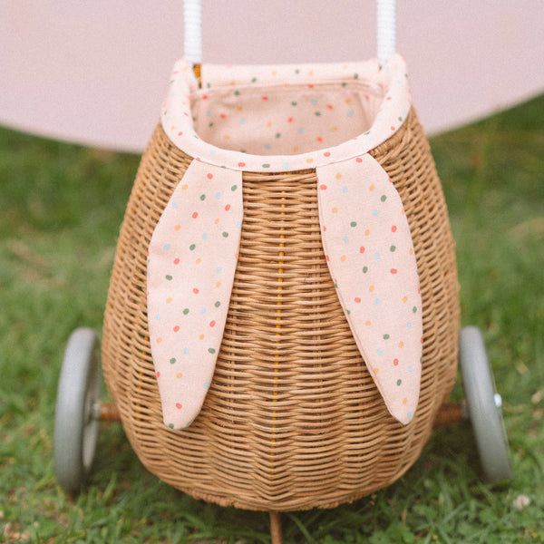 Rattan wheely basket with printed lining. Easter themed basket on wheels for kids to transport or store their favourite toys and treasures.