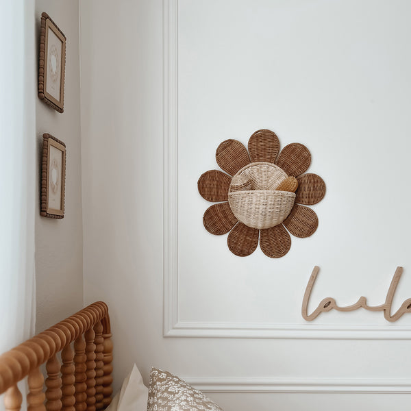 Daisy shaped rattan wall basket. A unique, flower shaped storage solution and beautiful rattan décor, perfect for your home or nursery. 
