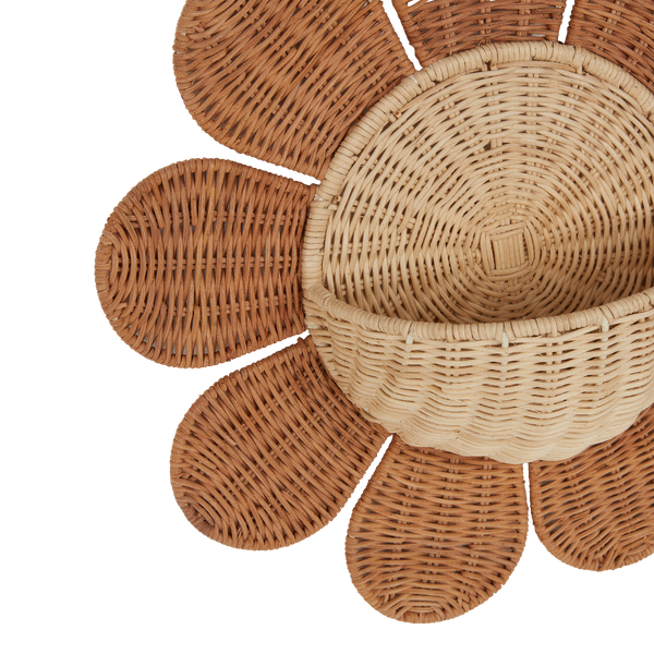 Handwoven rattan daisy shaped wall basket. The perfect décor addition to any nursery or bedroom. Flower Rattan wall storage solution.