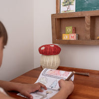 red mushroom basket made with rattan. Comes with wooden colouring pencils for the ultimate kids play kit.