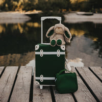 Olli Ella See-Ya Suitcase Forest Green pictured with washbag and Christmas themed Cozy
