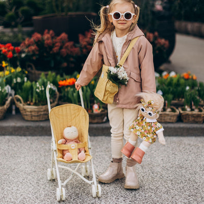 Olli Ella yellow doll pram for kids toys. Play with our posable dinkum dolls and teddies for kids doll play.