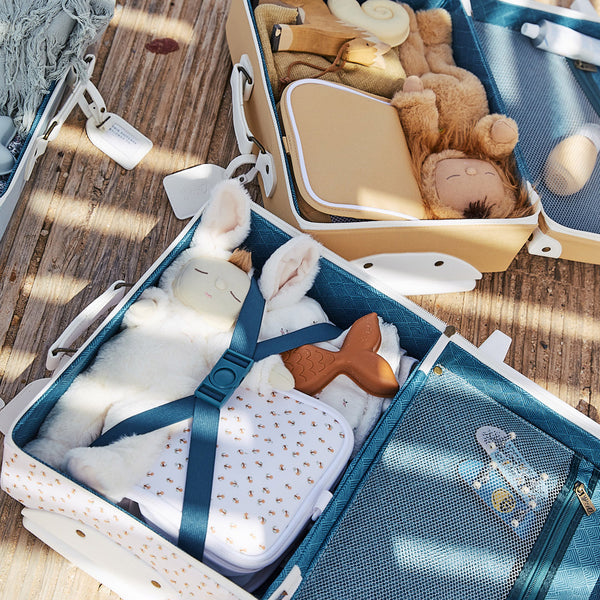 Kids travel suitcase in mushroom print. The perfect kids suitcase for holidays with compartments for dolls and trinkets.