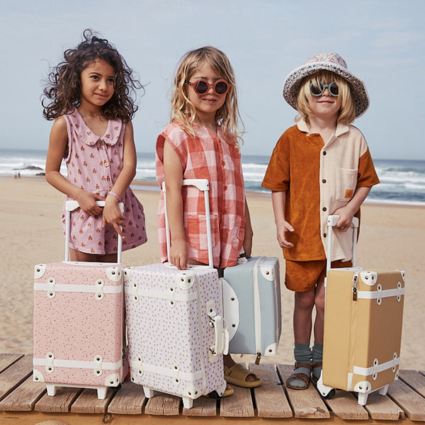 The ultimate kids travel suitcase. Mushrrom print suitcase for kids holidays, with straps to carry their favourite doll / toy.